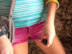 Delicious teen brunette is rubbing and pleasing pussy with dildo