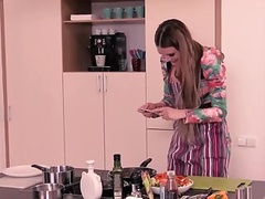 Hot MILF with big boobs blows lover's fuckstick in the kitchen