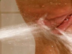 Skinny doll loves a good shower