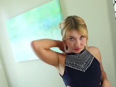 A blonde with blue eyes is sucking on a cock like a pro