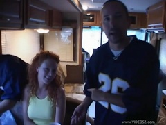 Busty redhead Audrey Hollander enjoying a gangbang