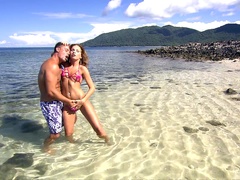 Beautiful girl Lauryn May takes care of a dick on the beach