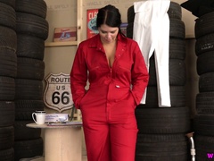 Incredibly hot busty mechanic girl Kylie K plays with her bald pussy