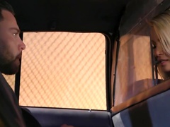 Female taxi driver and passenger play with genitals in the car