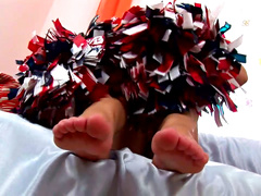 Sexy and hot cheerleader is showing her small tits