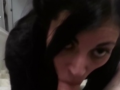 Good-looking brunette dame actively sucks dick and balls