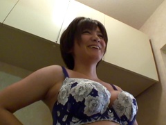 Shaved Japanese housewife gets her pussy toyed at home