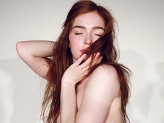 Awesome Russian redhead Jia Lissa in stripteasing casting solo show
