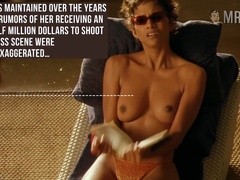Doing some sunbathing topless scene hot Halle Berry flashes her titties