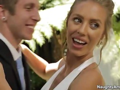 Sexy blonde bride Nicole Aniston is passionately kissed by the excited fiancÃ©