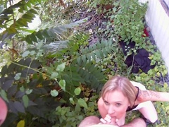 Hot blonde girl is having oral and vaginal sex outdoors
