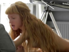 A redhead with a sexy smile is giving a blow job today