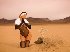 Ivizia Dakini nun praying in the desert