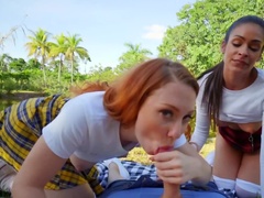 Depraved schoolgirls are having a threesome in the sunny day